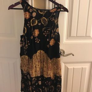 free people print flouny hem. Never been worn.